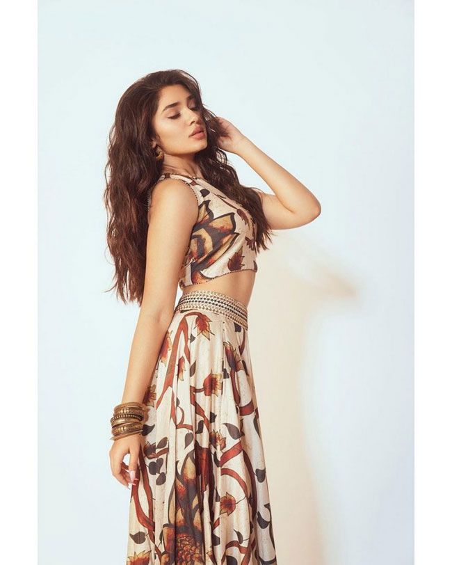 Krithi Shetty Staggering Poses In White Saree